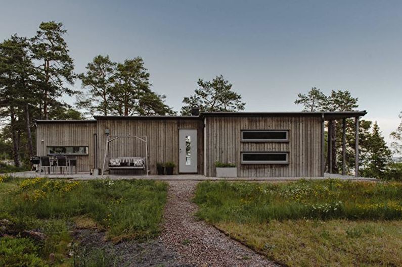 Fachada de una casa de campo en estilo escandinavo - foto