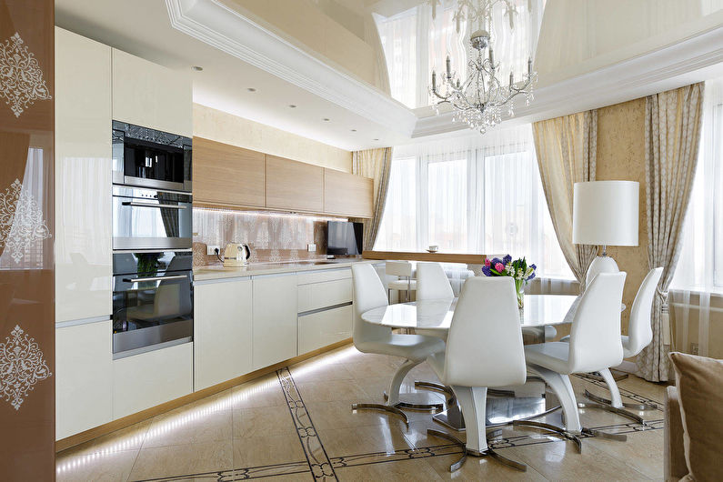 Beige stretch ceiling in the kitchen - photo