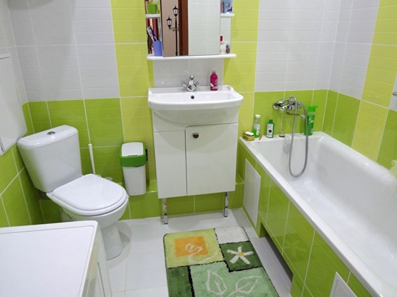 Diseño de un baño pequeño en colores verdes.