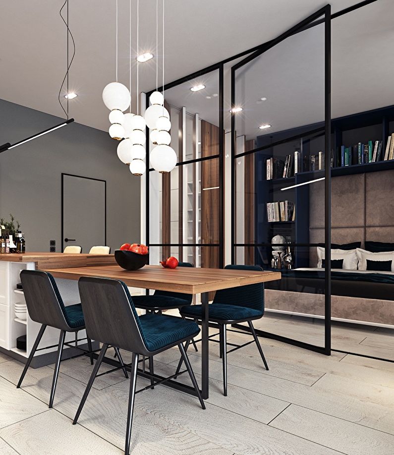 Glass partitions in the interior of the kitchen / dining room