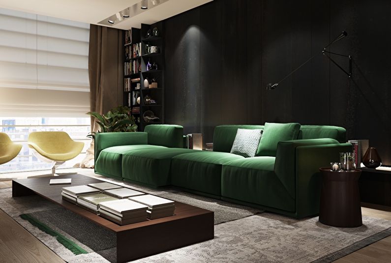 The combination of colors in the interior of the living room - black with green and brown