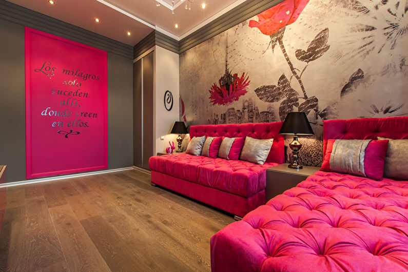 The combination of colors in the interior of the living room - pink with gray and brown