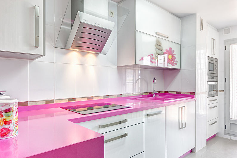 The combination of colors in the interior of the kitchen - pink with white