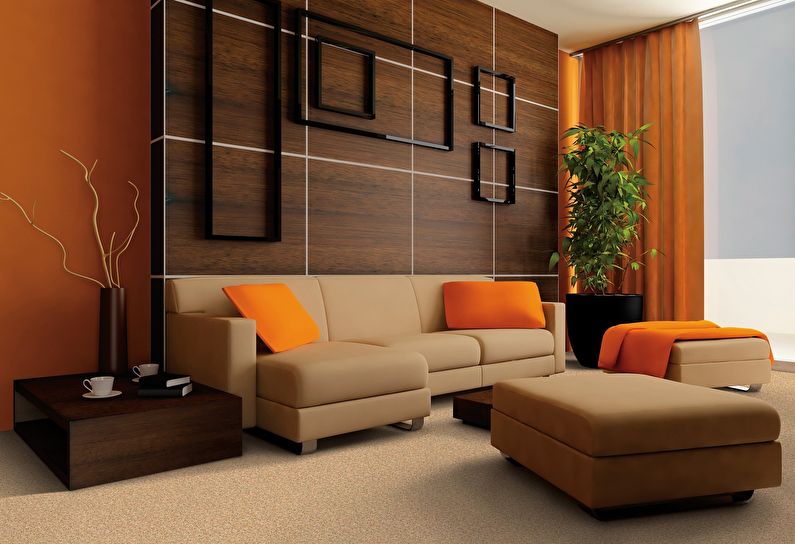 The combination of colors in the interior of the living room - brown with orange and beige