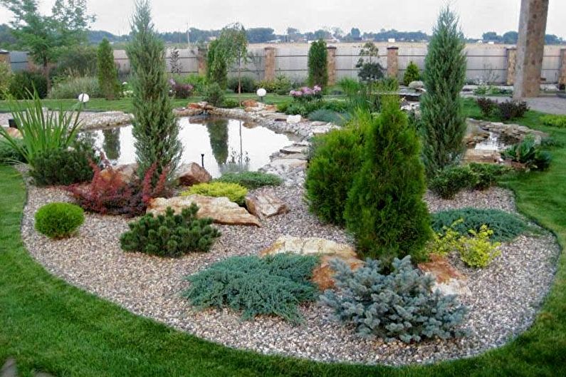 Jardin en pierre - Parterre de fleurs au chalet, idées d'aménagement paysager