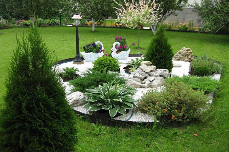 Jardín de piedra - Macizo de flores en la cabaña, ideas para el diseño del paisaje