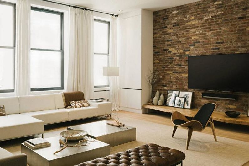 Brick wall in the living room interior - photo