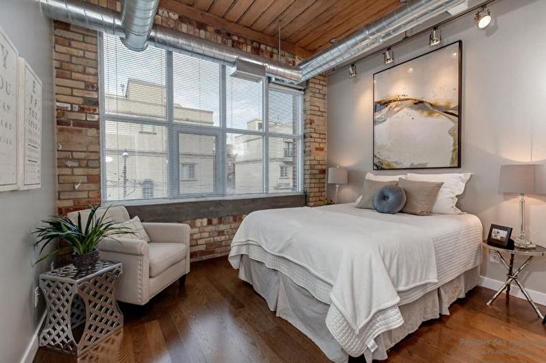 Brick wall in bedroom interior - photo