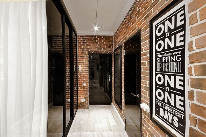 Brick wall in the interior of the hallway, corridor - photo