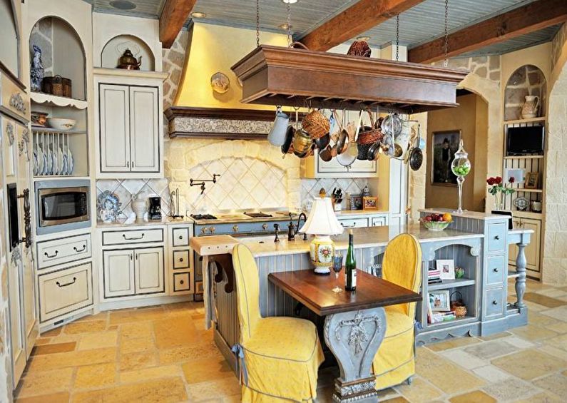 Interior design of kitchen in country style - photo