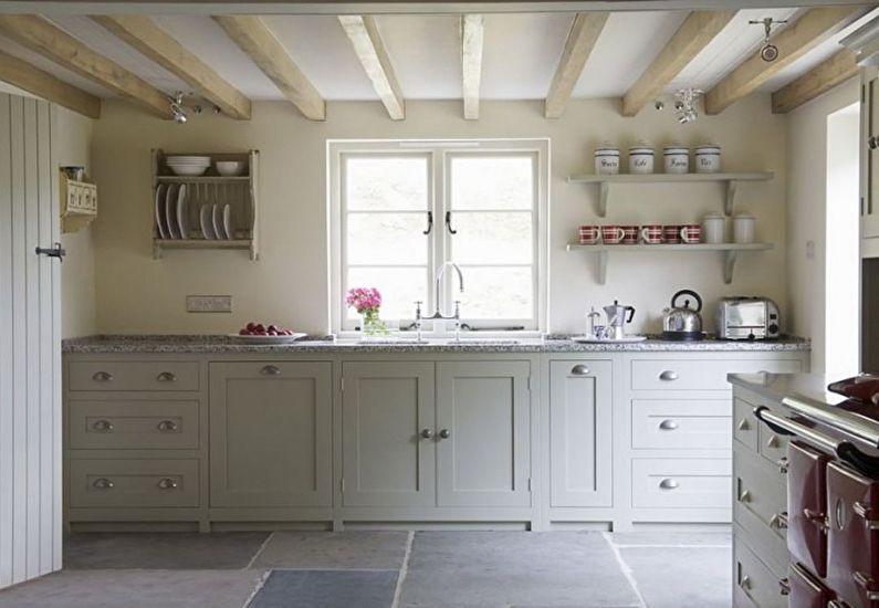 Interior design of kitchen in country style - photo