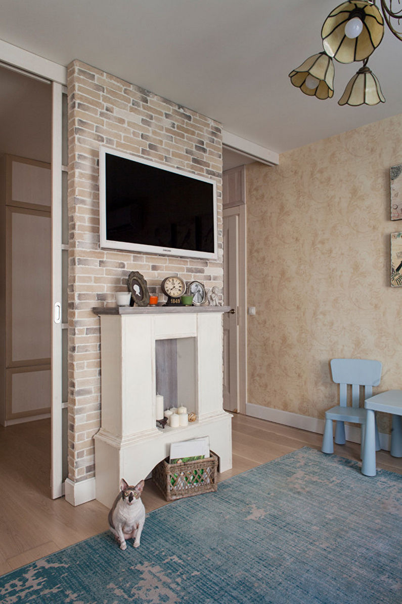 Fireplace in the living room interior - photo