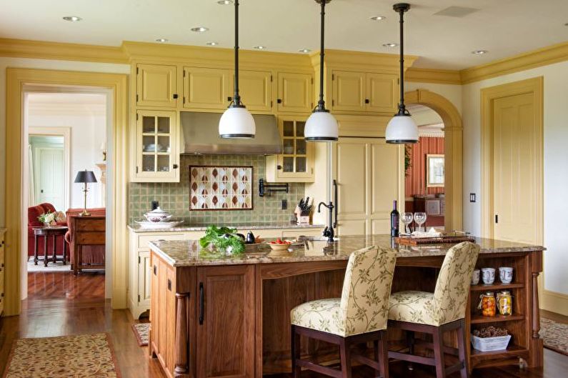 Kitchen interior design in yellow - photo