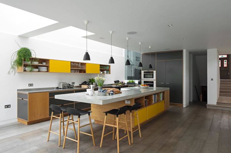 Kitchen interior design in yellow - photo