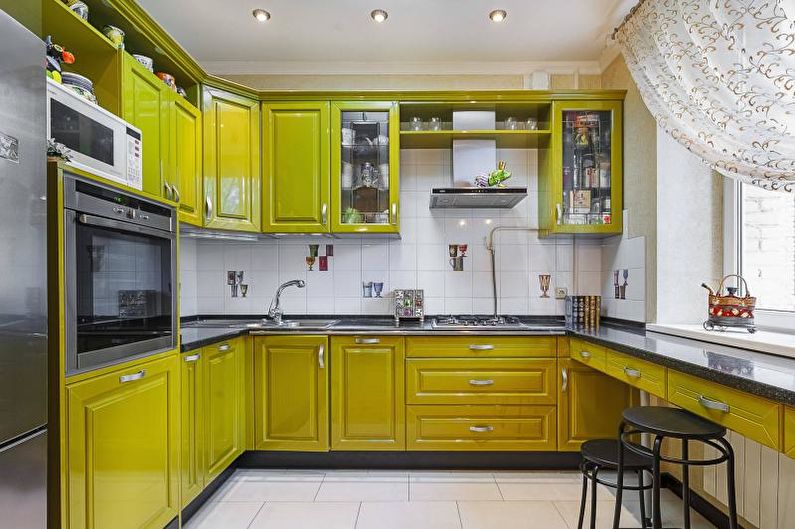 Kitchen interior design in yellow - photo