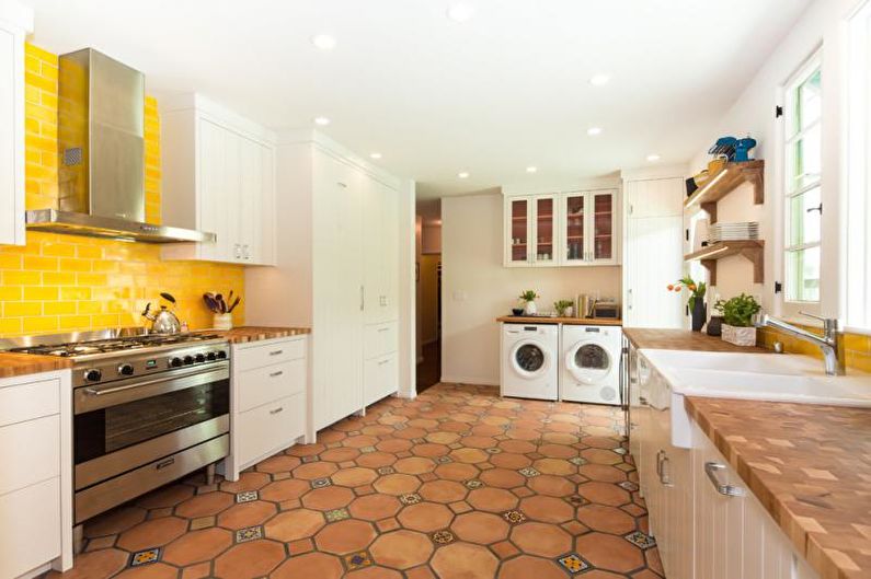 Kitchen interior design in yellow - photo