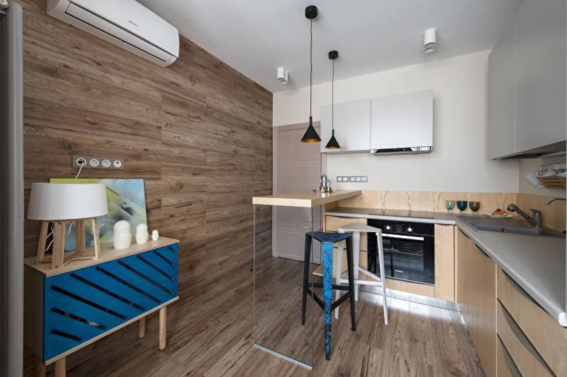 Laminate on the wall in the interior of the kitchen - photo