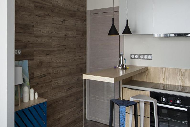 Laminate on the wall in the interior of the kitchen - photo