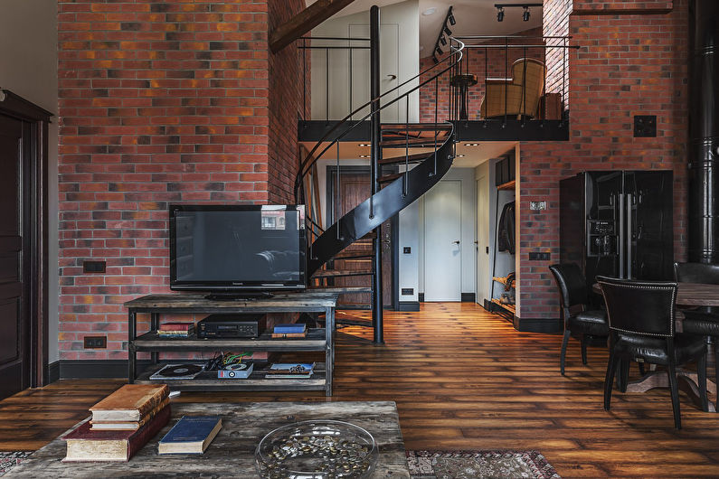 Interior de un apartamento de dos pisos en estilo loft - foto