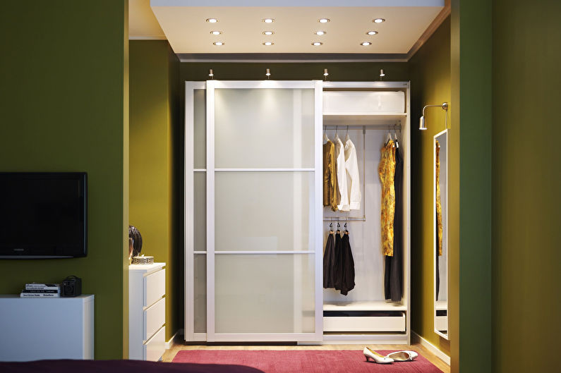 Sliding wardrobes for a hall in a modern style