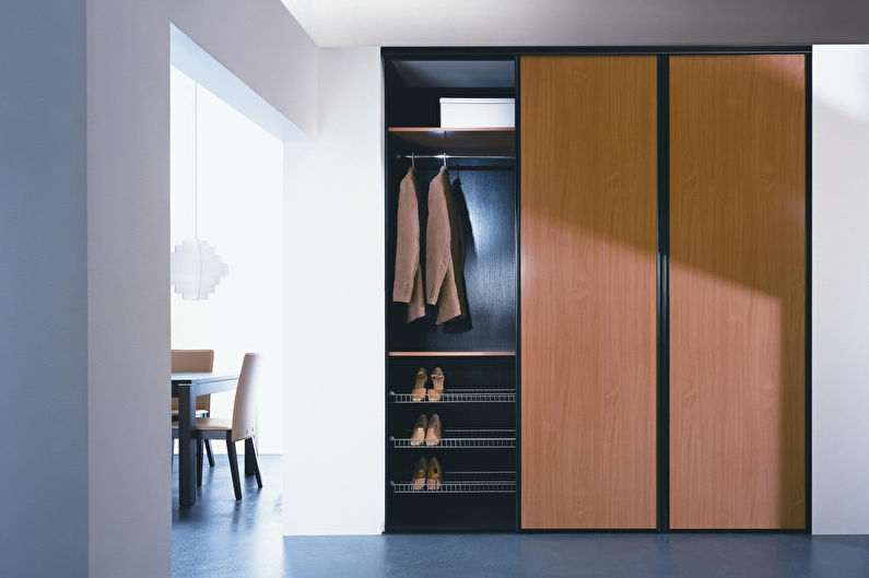 Sliding wardrobes for a hall in the style of minimalism