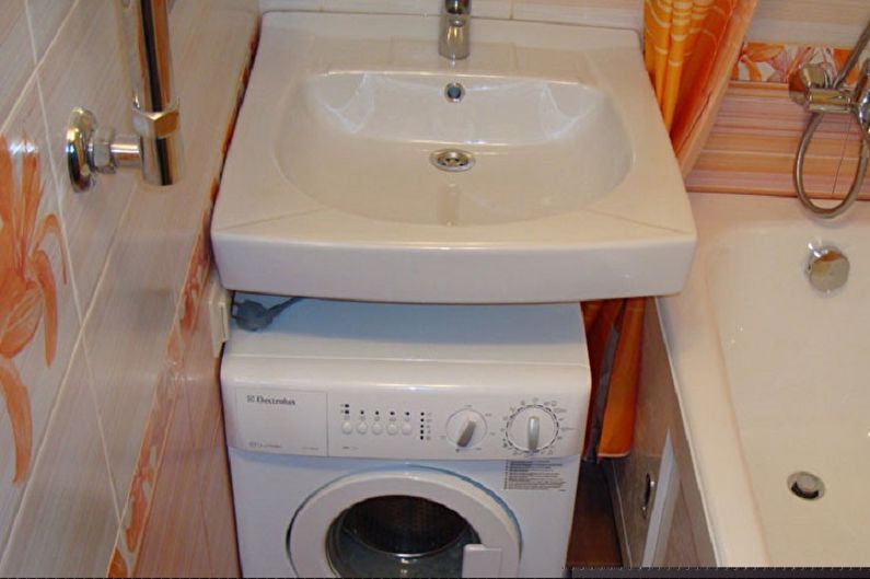 Sink above the washing machine - photo