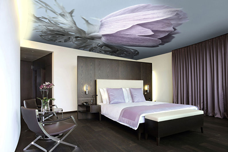 Stretch ceilings in the bedroom - photo