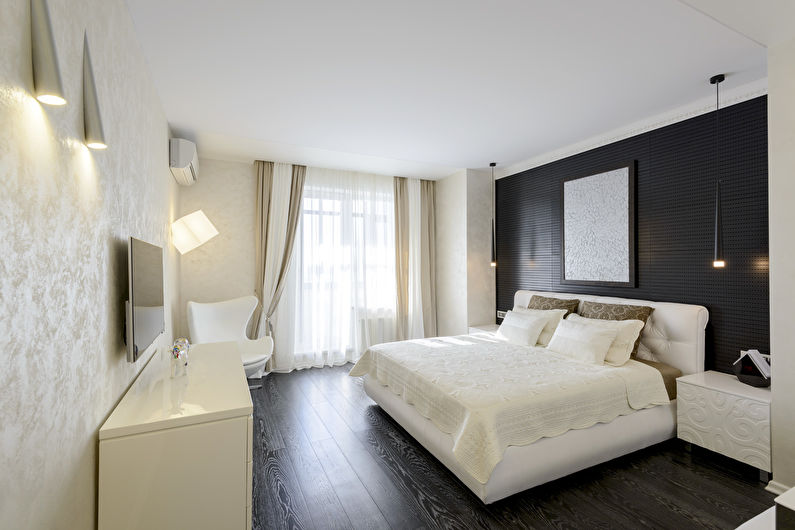 White matte stretch ceiling in the bedroom - photo