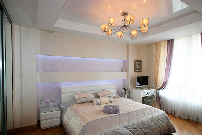 Stretch ceilings in the bedroom - photo