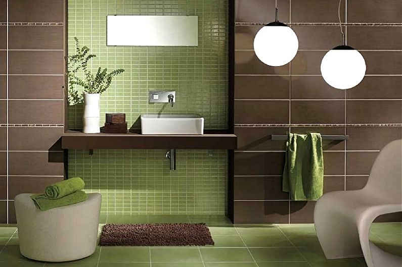 Color verde en el interior del baño. Combinación de colores.