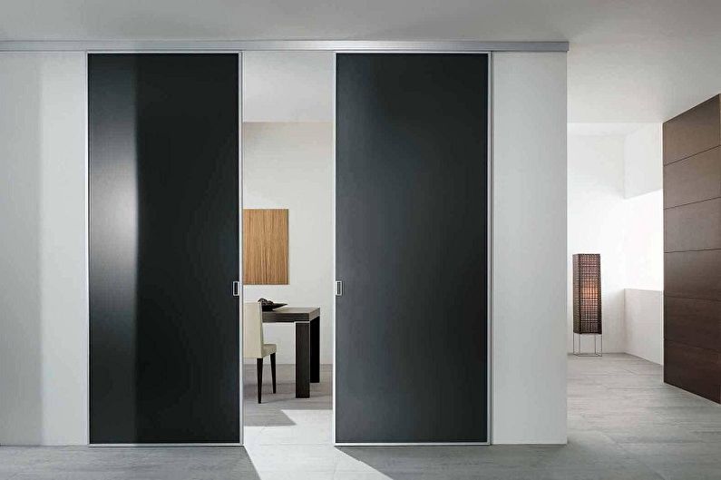 Tipus de material per a portes corredisses interiors - Metall