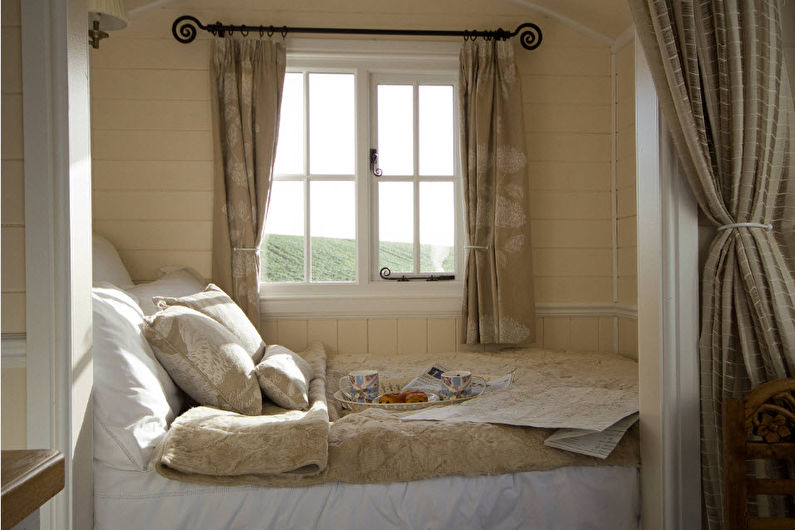 Aménagement intérieur d'un salon combiné avec une chambre - photo