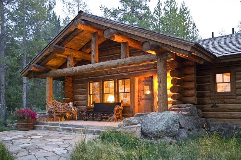 Modern projects of log houses - Log house with a veranda