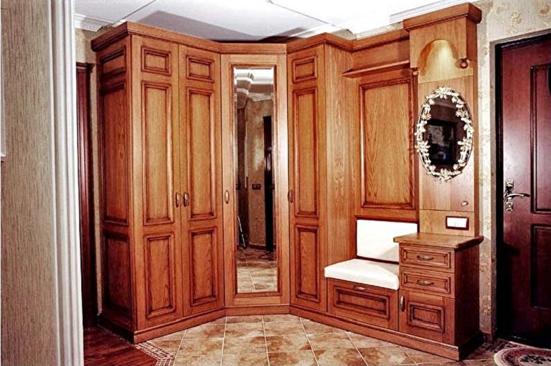 Solid wood corner cupboard in the hallway