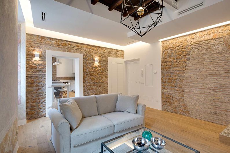 Decorative stone in the living room interior - photo