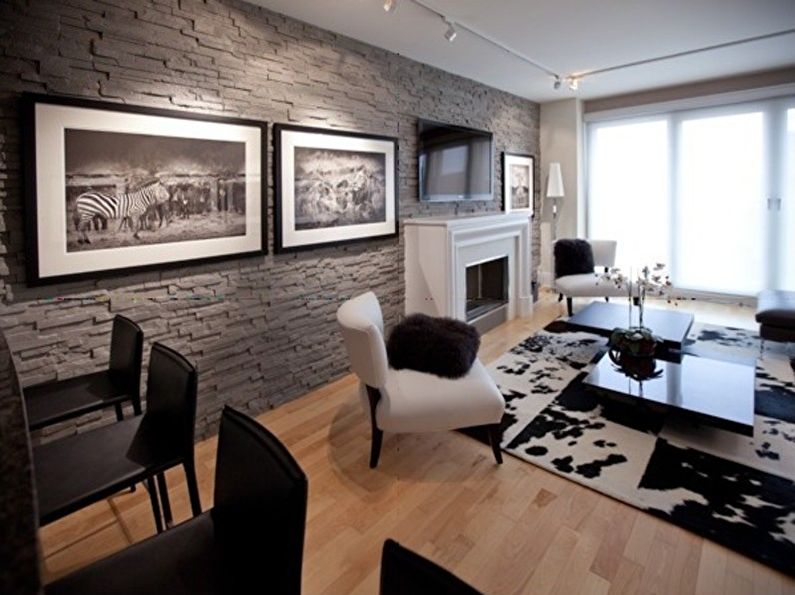 Decorative stone in the living room interior - photo