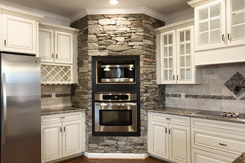 Decorative stone in the interior of the kitchen - photo