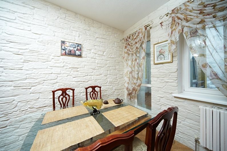 Decorative stone in the interior of the kitchen - photo