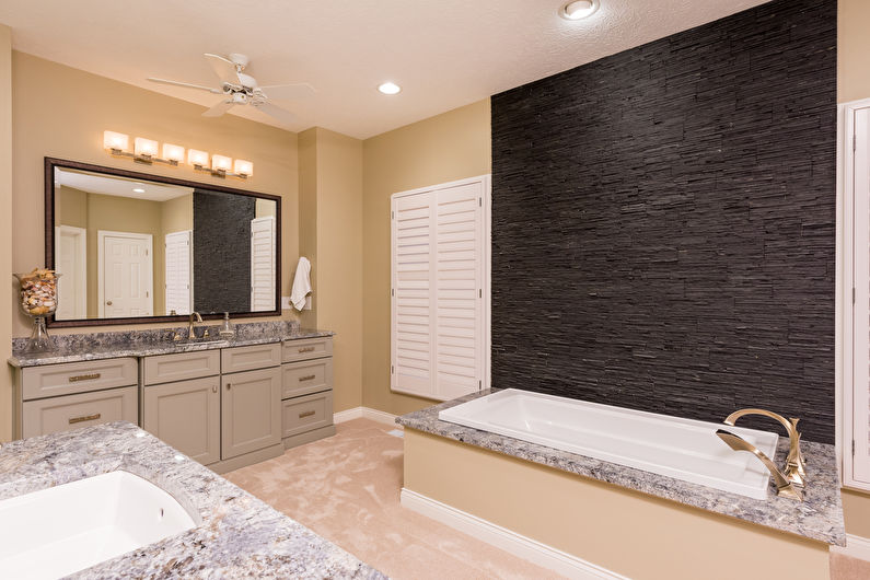 Decorative stone in the interior of the bathroom - photo