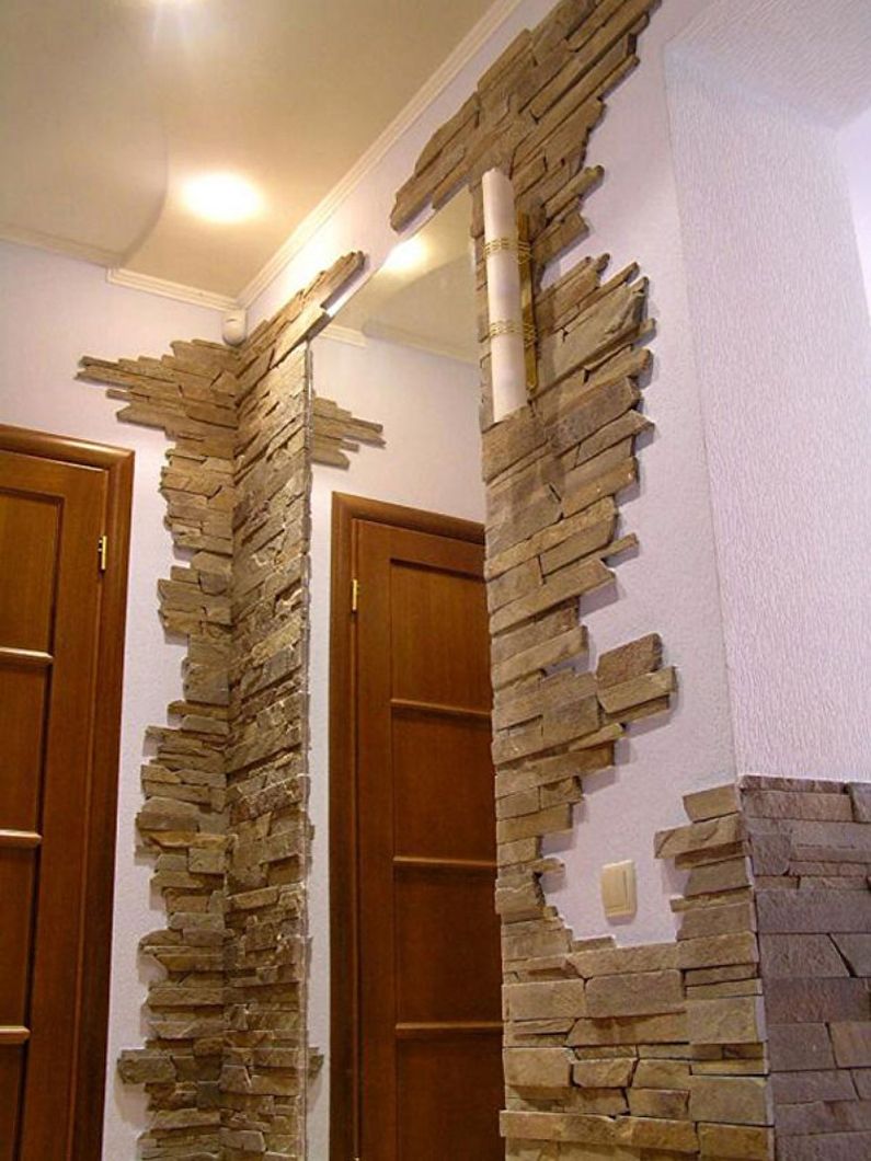 Mirror decoration in the hallway with decorative stone - photo