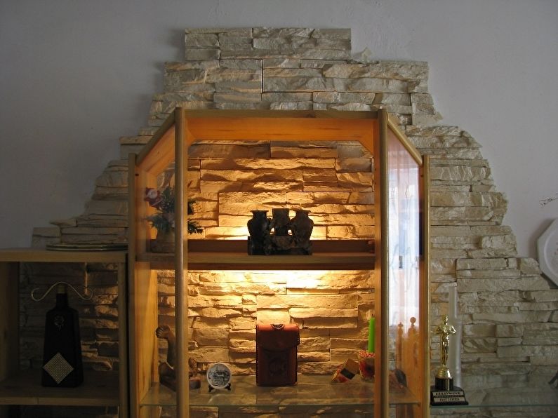 Decorative stone in the interior of the apartment - photo