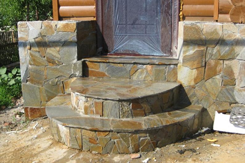 Stone porch decoration for a private house - photo