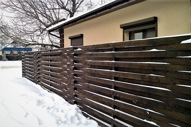 Clôtures en bois pour une maison privée - photo