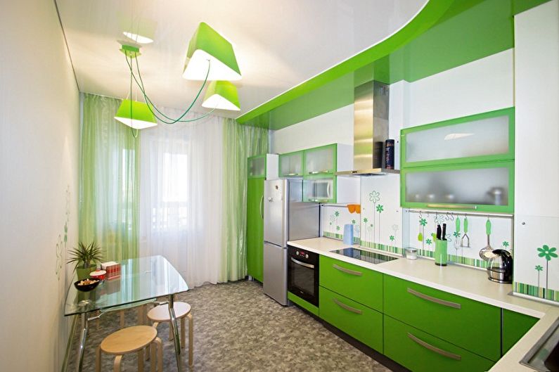 Interior design of a white-green kitchen - photo