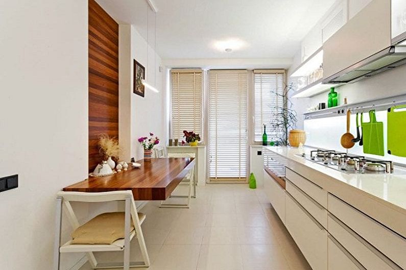 Interior design of a white-green kitchen - photo