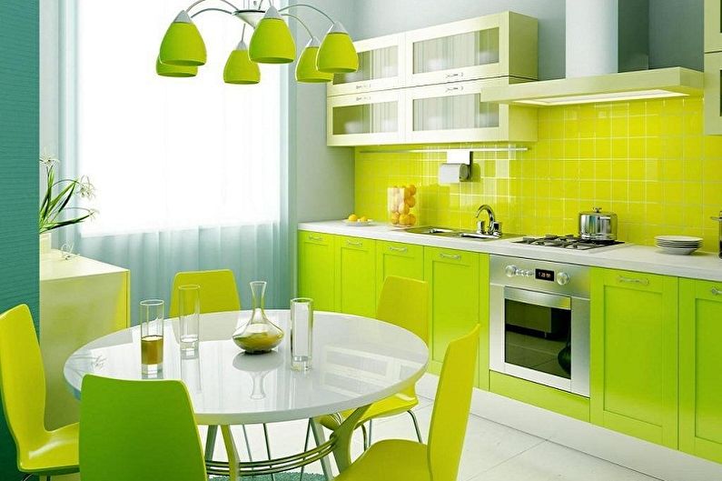 Interior design of a white-green kitchen - photo